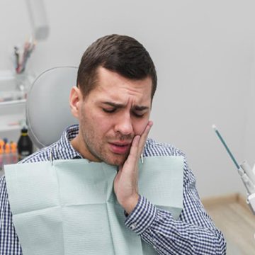 Why Does Food Always Get Stuck in My Teeth? Here’s What It Could Mean